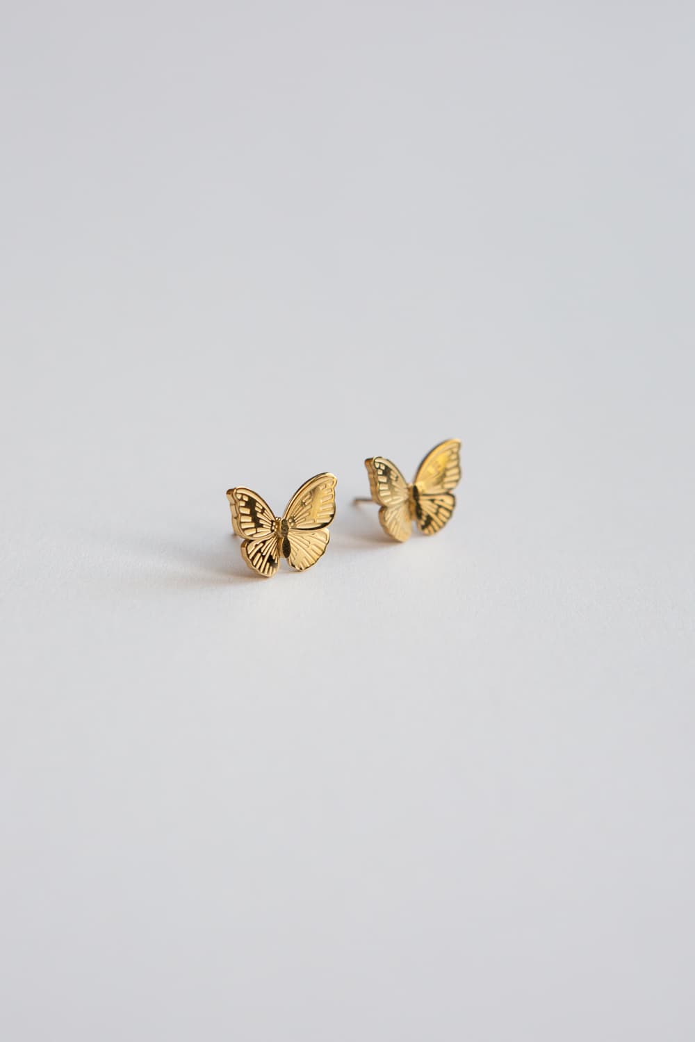 Butterfly earrings with Golden shadow Swarovski crystals – Dige Designs